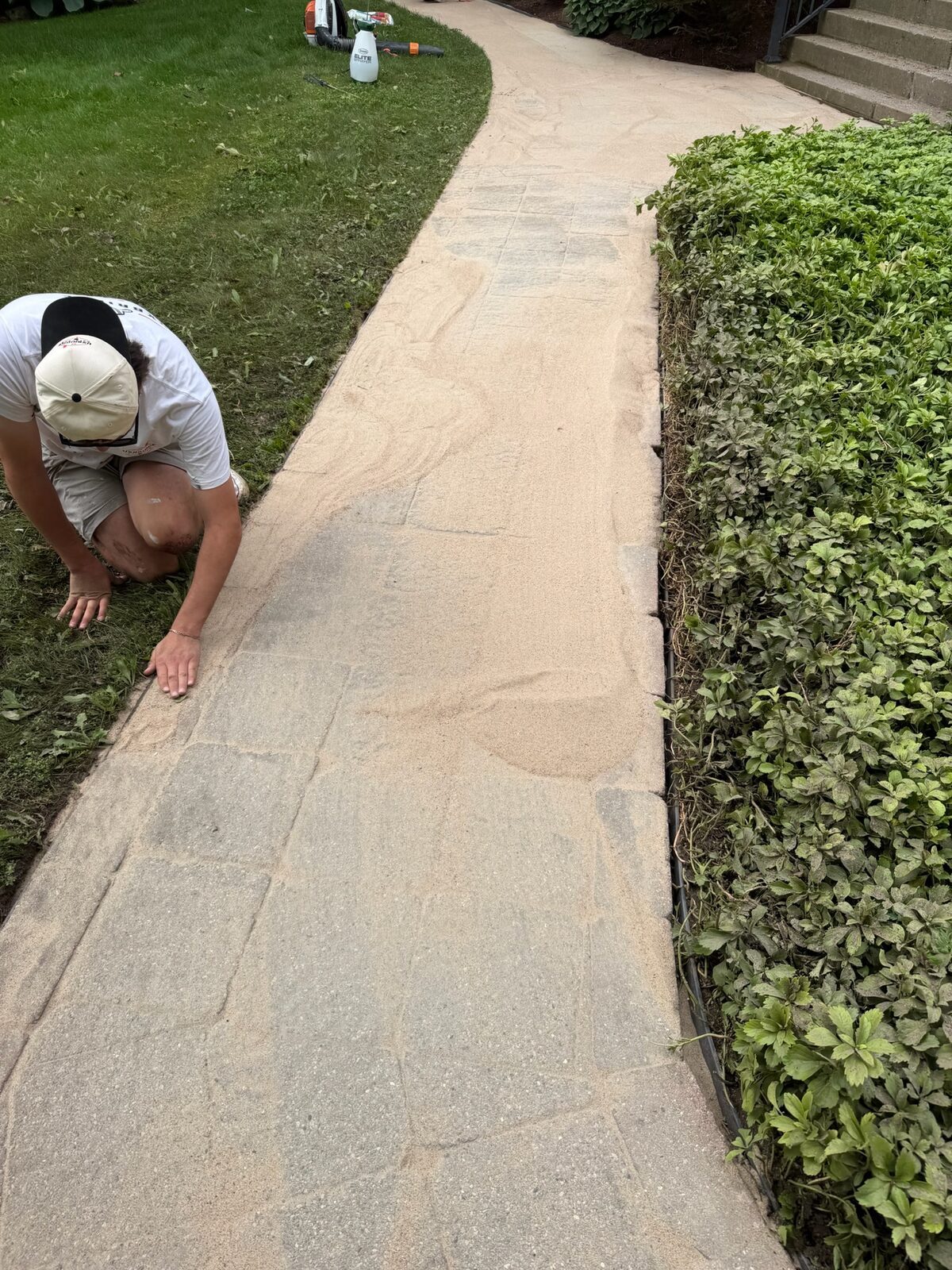 Polymeric sanding on pavers